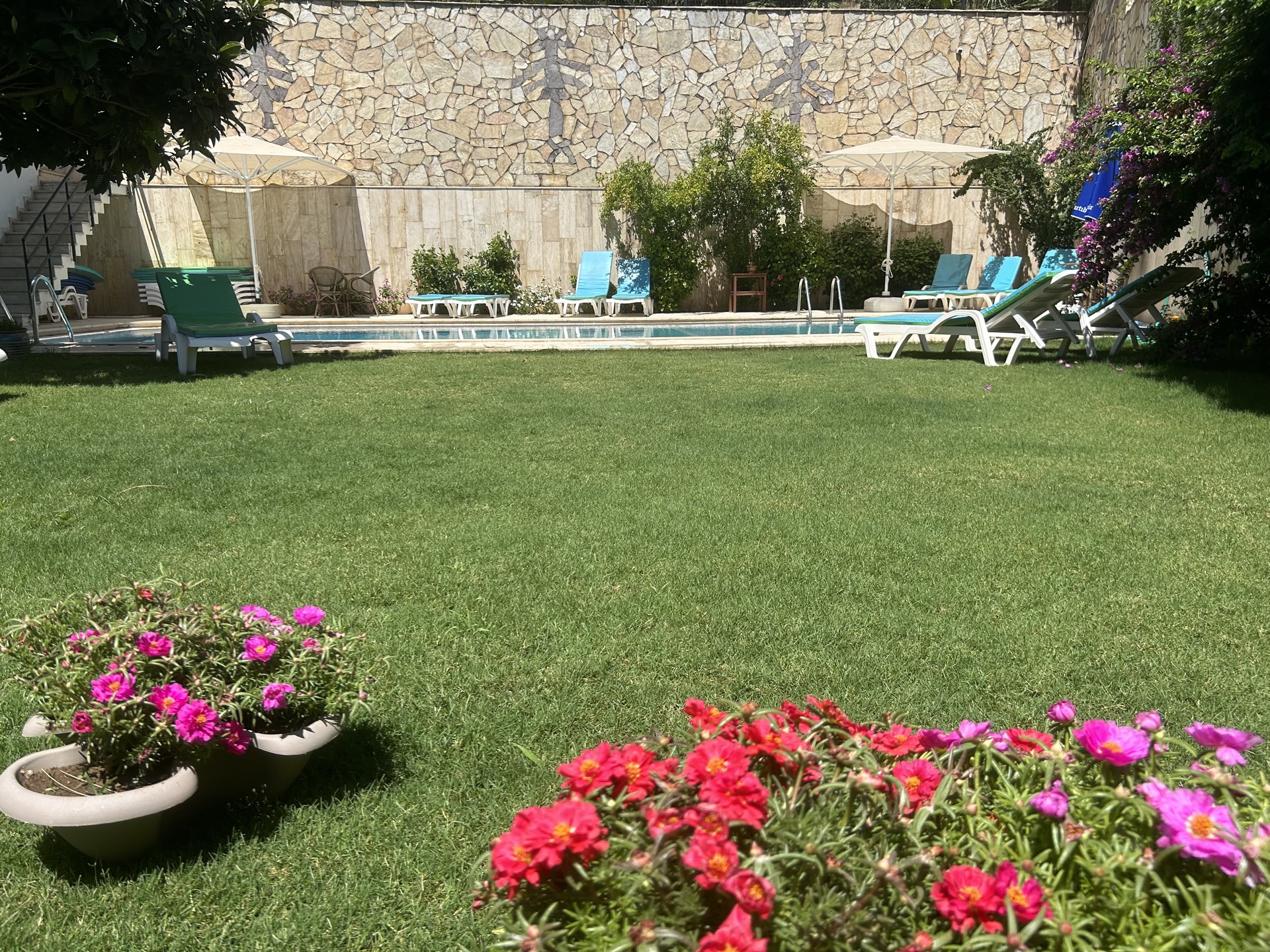 White Suites Icmeler garden and pool